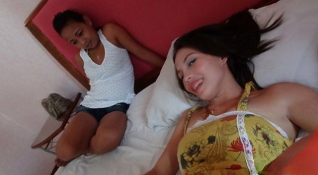 Filipina amateurs Fhae and Ann engage in bareback sex with a sex tourist