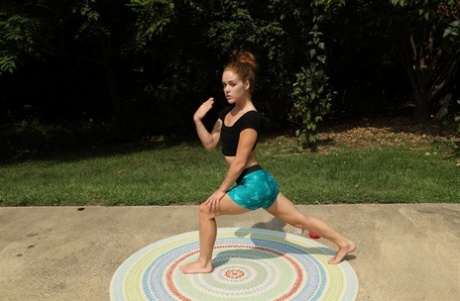 Slender teen girl Kymberly Brix toys her horny cunt after yoga session