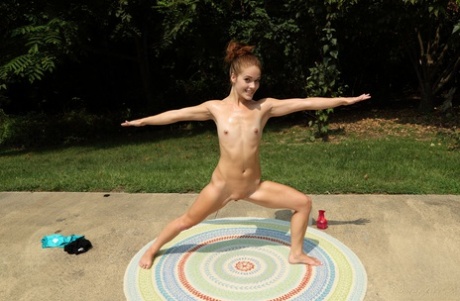 Slender teen girl Kymberly Brix toys her horny cunt after yoga session