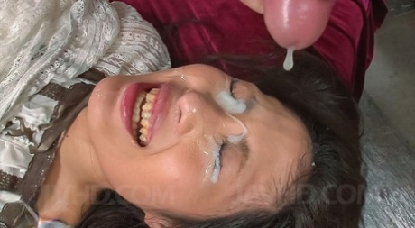 Japanese girl Aoi Miyama gets jizz on her face from a bunch of guys