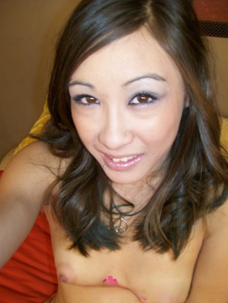 Filipina teen takes self shots while getting totally naked