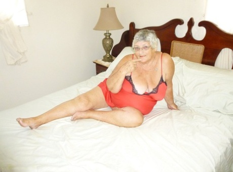 Old British woman Grandma Libby removes lingerie while toying her snatch