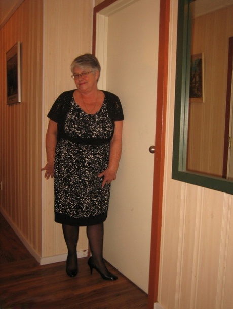 Chubby granny Girdle Goddess gets naked with her pantyhose pulled down