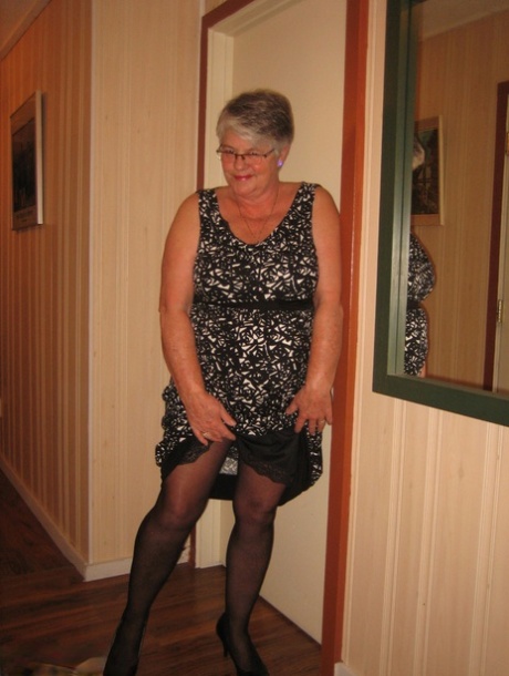 Chubby granny Girdle Goddess gets naked with her pantyhose pulled down