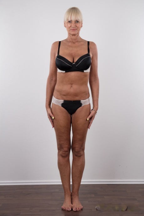 Older blonde lady Daniela stands proud and straight during nude posing debut
