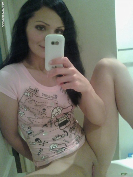 Brunette ex girlfriend takes selfies of her tits and shaved pussy