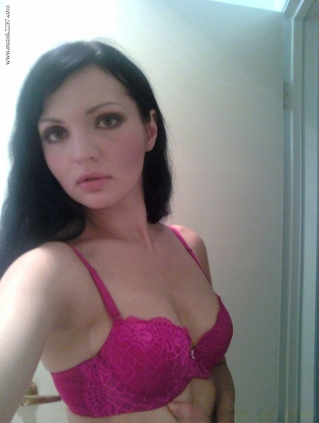 Brunette ex girlfriend takes selfies of her tits and shaved pussy
