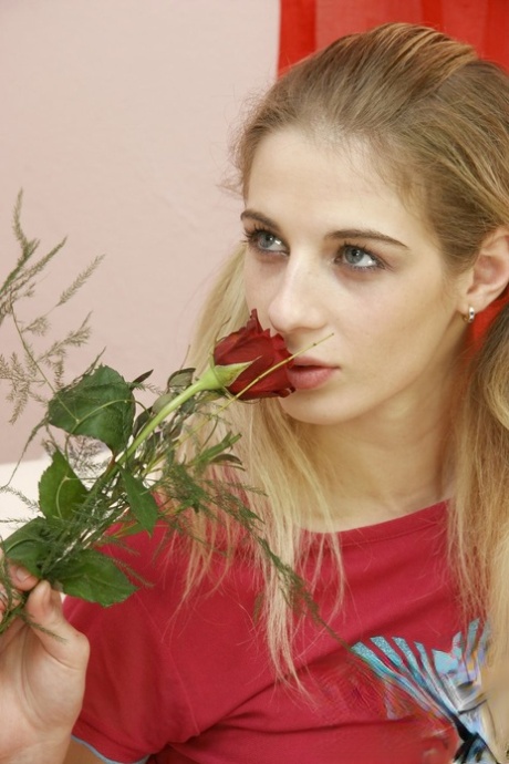 Young looking girl fucks an old man after he seduces her with a single rose