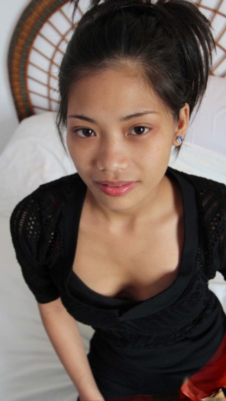 Slim Filipina girl Franciska undresses before enduring breast groping