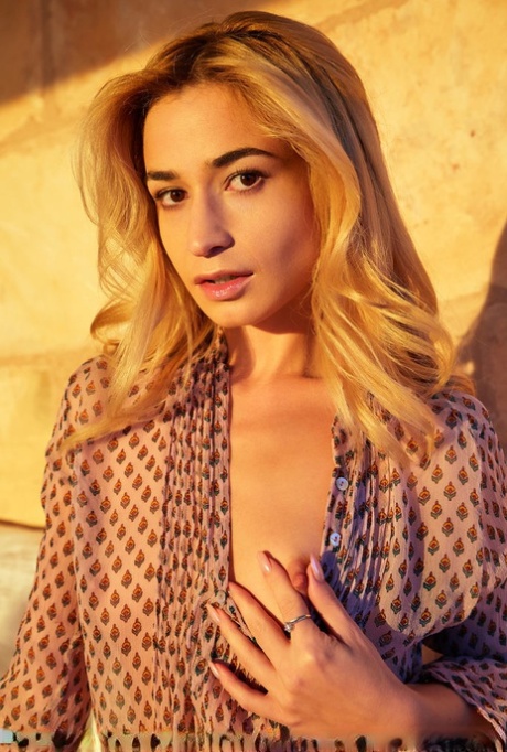 Blonde teen Susie hits upon great nude poses on top of her bed