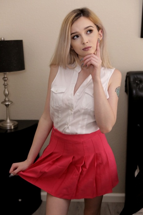Young blonde Lexi Lore takes a cumshot on her ass in doggystyle position