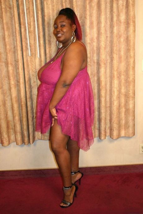 Ebony fatty with saggy breasts partakes in black on black pussy to mouth sex