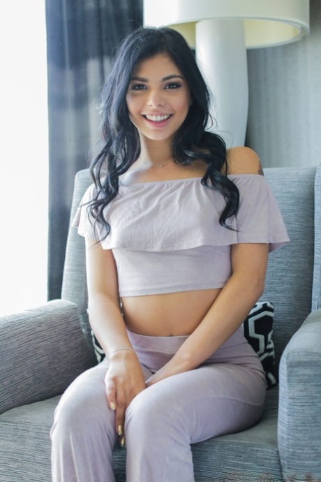 Brazilian teen Gina Valentina slips yoga pants over her booty to get naked