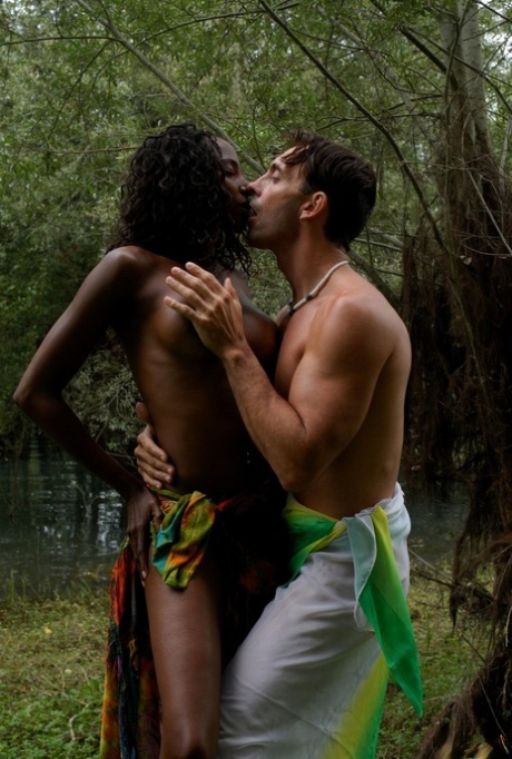 Hot black girl has her firm tits & bubble butt freed from a bikini near water
