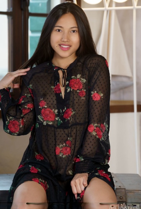 Asian teen May Thai removes her dress and heels to model totally naked
