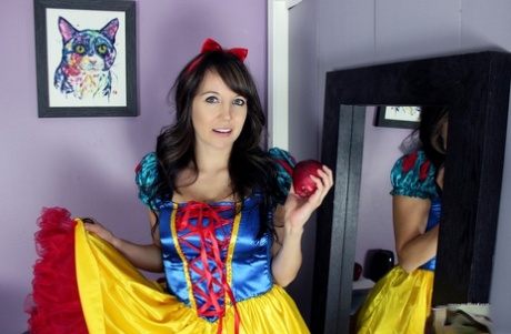 Brunette amateur Andi Land exposes herself while wearing a Snow White outfit