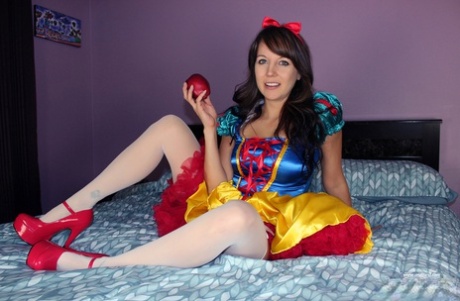 Brunette amateur Andi Land exposes herself while wearing a Snow White outfit