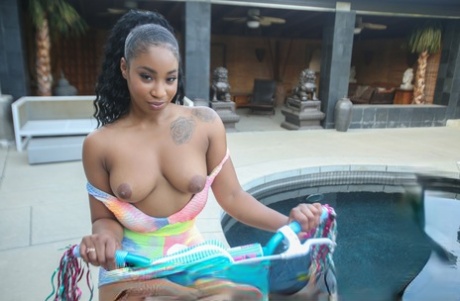 Black teen Lala Ivey holds her phat ass during black on black sex