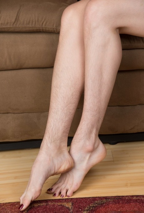 Brunette lady Lucia shows off her incredibly hairy body as she gets undressed