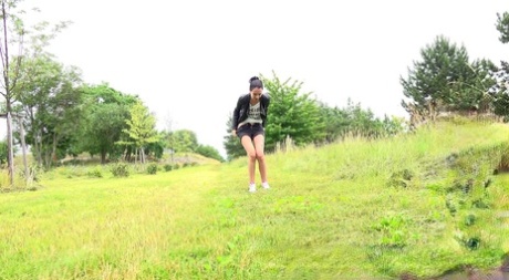 Tall girl Mistica squats for a piss while taking a shortcut through a field