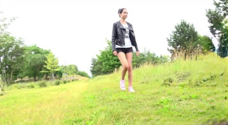 Tall girl Mistica squats for a piss while taking a shortcut through a field