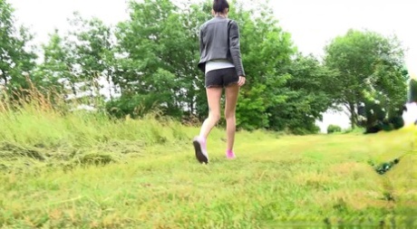 Tall girl Mistica squats for a piss while taking a shortcut through a field