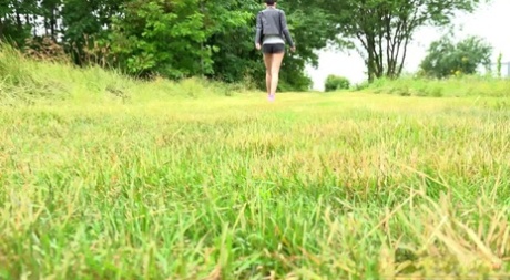 Tall girl Mistica squats for a piss while taking a shortcut through a field