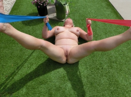 Chubby blonde lady Barby gets naked while exercising in her backyard