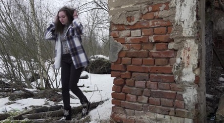 Nice girl Vika Lita gets caught with her pants down while peeing on the snow