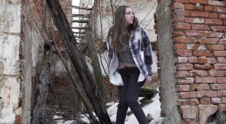 Nice girl Vika Lita gets caught with her pants down while peeing on the snow