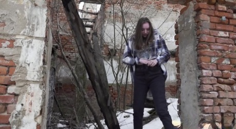 Nice girl Vika Lita gets caught with her pants down while peeing on the snow