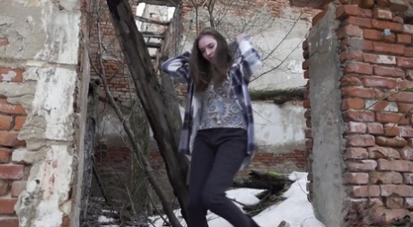 Nice girl Vika Lita gets caught with her pants down while peeing on the snow
