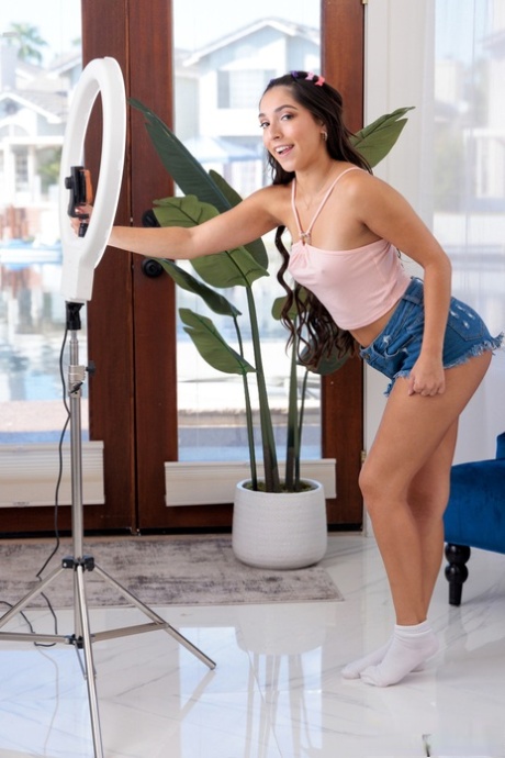 Brunette teen Madison Wilde has sex with her stepbrother on a sofa