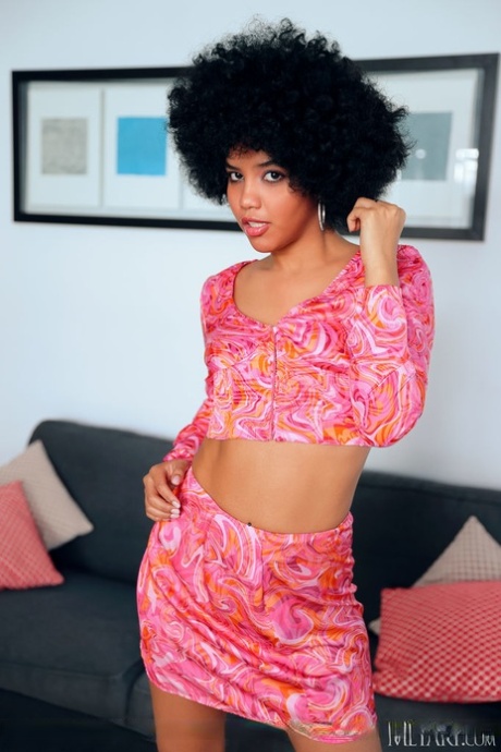 Brazilian chick with big hair Selva Lapiedra gets bare naked during a solo gig
