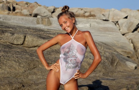 Leggy solo model Clover has no qualms about walking around naked in public