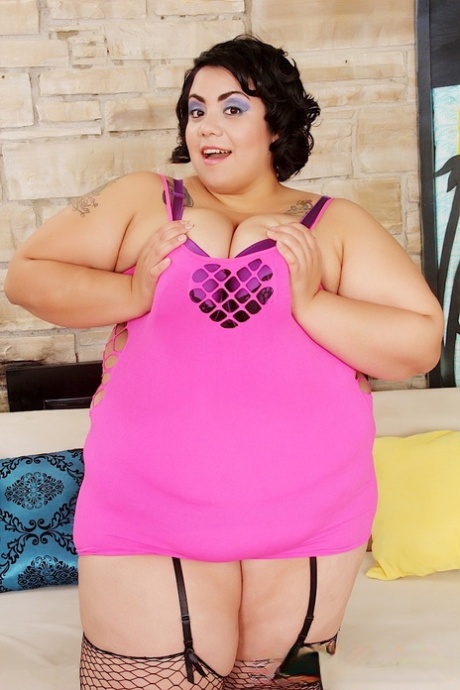 SSBBW Mia Riley in lace lingerie & fishnet stockings flaunting massive breasts