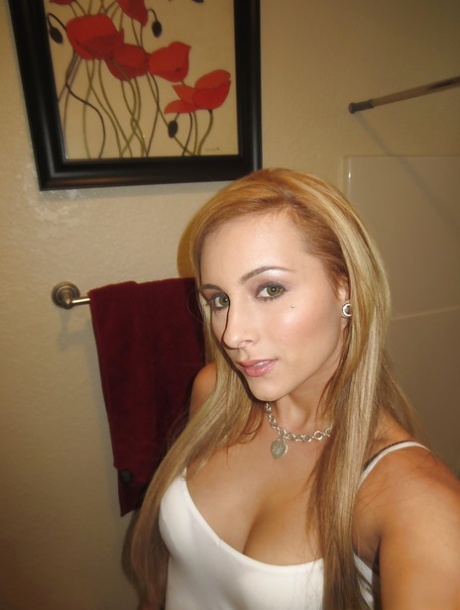 Beautiful blonde slut Nikki loves self shot undressing