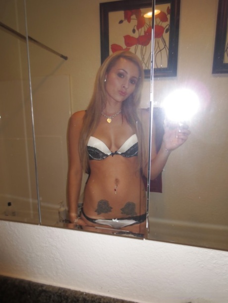 Beautiful blonde slut Nikki loves self shot undressing
