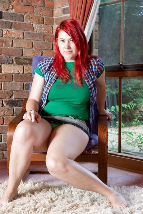 Chubby redhead teen Adalin shows off her puffy hairy pussy and fat butt