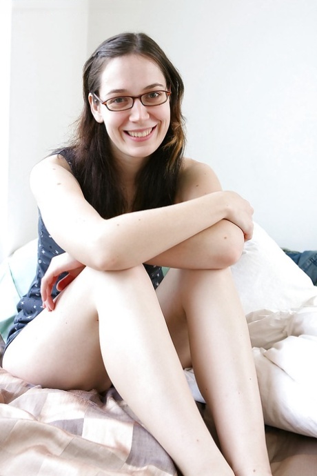 Nerdy brunette amateur Gabrielle bends over for hairy cunt spreading