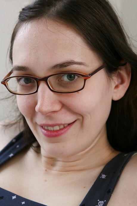 Nerdy brunette amateur Gabrielle bends over for hairy cunt spreading
