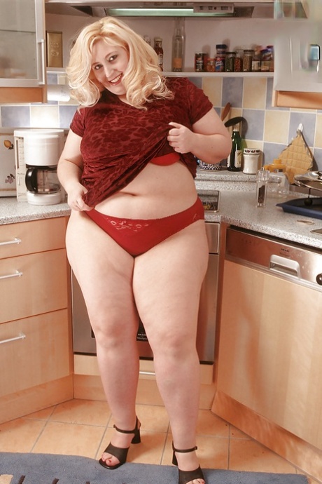 Busty blonde SSBBW Radka masturbating in kitchen with sex toy