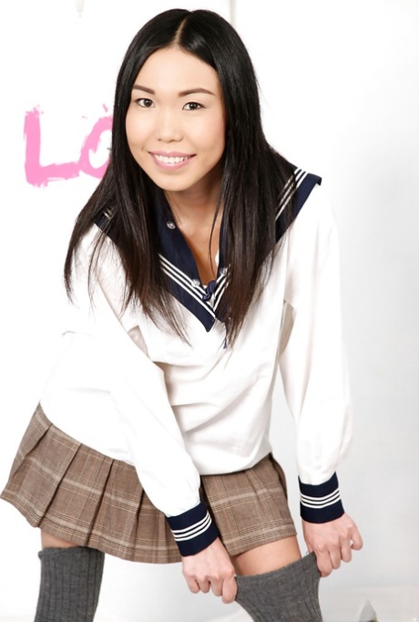 Asian amateur flashing upskirt panties in over the knee socks