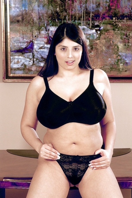 European BBW pornstar Kerry Marie revealing monster tits before crossing legs