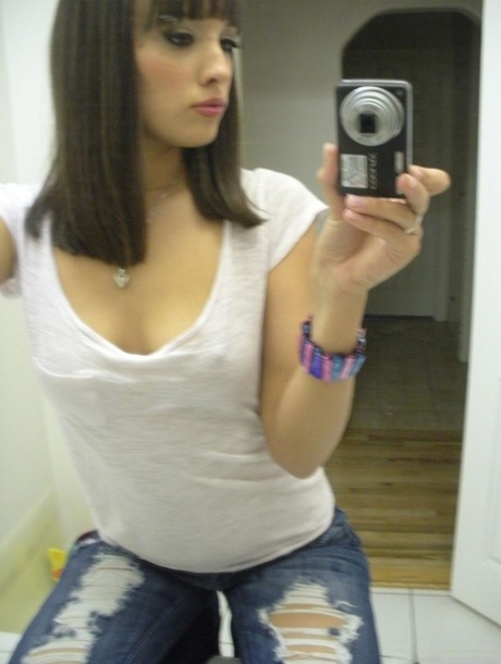 Ex-girlfriend Nadia Aria undresses in bathroom mirror while taking self shots