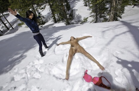 Naughty girl gets paid for making snow angels absolutely naked