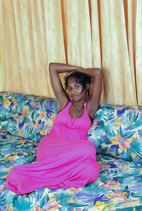 Lovely Indian busty babe Sunita stripping and spreading her legs