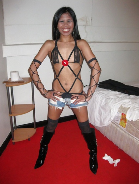 Filthy asian babe taking off her shorts and panties and getting slammed