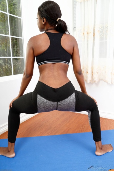Ebony sweetie Yara Skye massages her meaty pussy after her yoga class