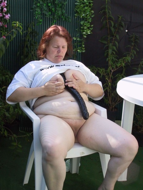 Redhead BBW Berta takes a huge toy up her mature pussy and milks a cock